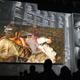 Nothing says “obscurity” like 15-foot-high images of the characters’ faces.